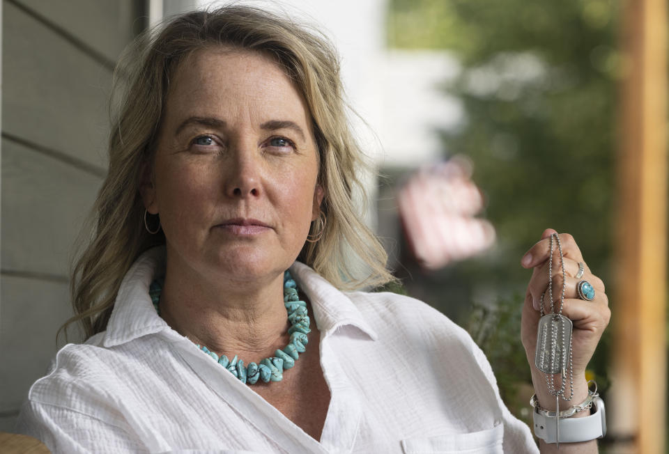 Doreen Jenness, the widow of Air Force Capt. Jason Jenness, sits for a portrait during an interview with the Associated Press at her home in Missoula, Mont., Aug. 26, 2023. Capt. Jenness was a Malmstrom missileer who died of non-Hodgkin lymphoma in 2001 at the age of 31. (AP Photo/Tommy Martino)