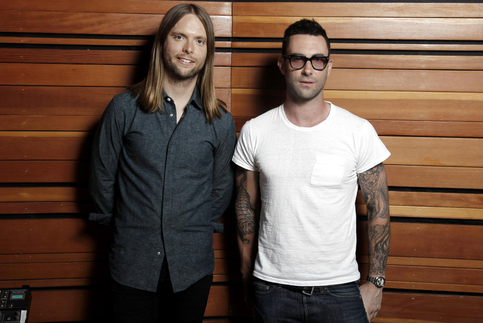 This May 22, 2012 photo shows Adam Levine, right, and James Valentine of the band Maroon 5, posing for a portrait in Los Angeles. The latest release by Maroon 5, "Overexposed," was released on Tuesday, June 26. (Photo by Matt Sayles/Invision/AP)