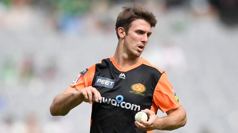 Seen here, Perth Scorchers allrounder Mitch Marsh gets ready to bowl.