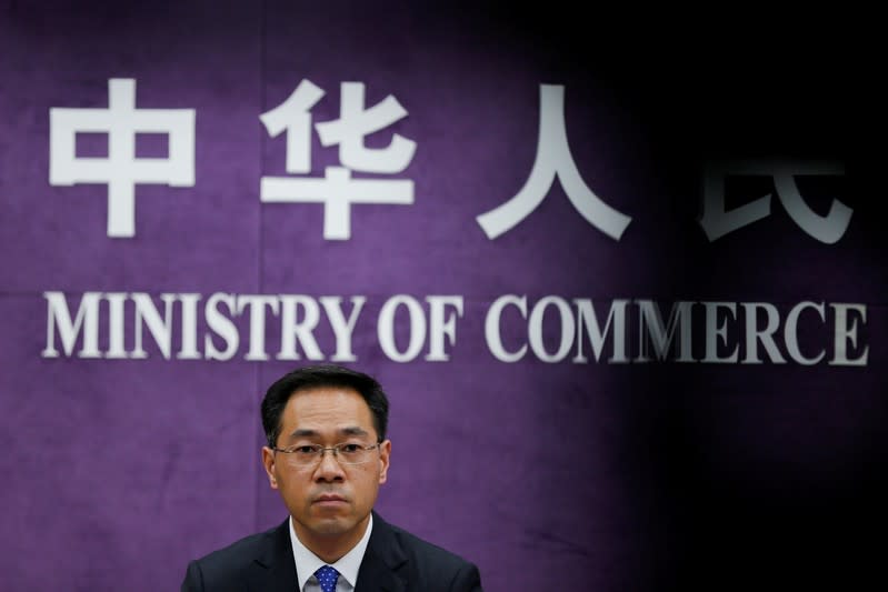 China's Ministry of Commerce spokesperson Gao Feng attends a news conference at the commerce ministry in Beijing