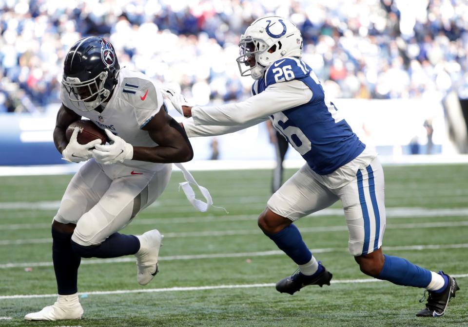 Indianapolis Colts cornerback Rock Ya-Sin (26) pushes Tennessee Titans wide receiver A.J. Brown (11) toward the sideline Sunday, Oct. 31, 2021, during a game against the Tennessee Titans at Lucas Oil Stadium in Indianapolis.