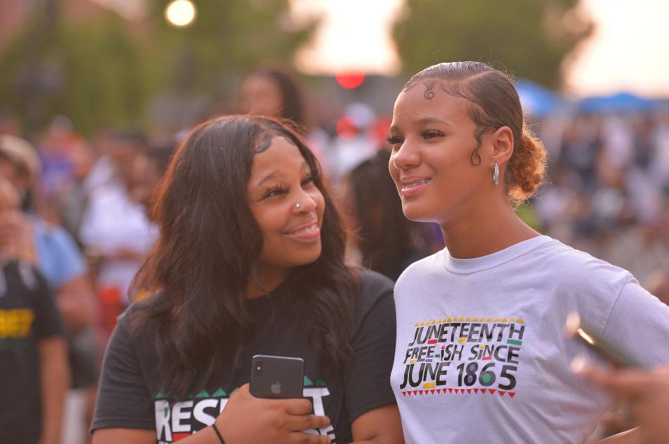 A crowd participates in the Juneteenth Block Party celebration at the Love Where You Live Park in downtown Spartanburg Friday evening, June 17, 2022. The city's weekend-long event celebrates the African-American experience since the end of slavery in 1865. 