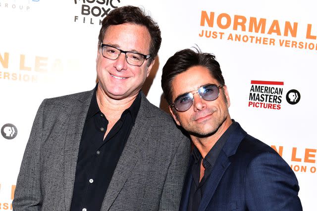 <p>Vivien Killilea/WireImage</p> (L-R) Bob Saget and John Stamos attend the Los Angeles Premiere of 'Norman Lear: Just Another Version of You' on July 14, 2016 in Los Angeles, California.