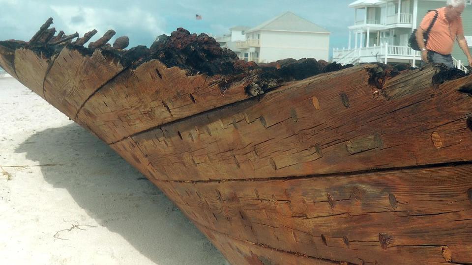 The wreckage of the schooner Rachel sits on Fort Morgan beach in Gulf Shores, Ala., on Thursday, Sept. 6, 2012. The Rachel ran aground during a storm on Oct. 17, 1923. She has been uncovered and re-covered by storms and hurricanes many times since, and was uncovered again during Hurricane Isaac. (AP Photo/Melissa Nelson Gabriel)