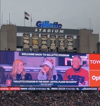 “Gillette Stadium is the most joyful place on Earth,” the quote read — but it didn’t look like she was having a “joyful” experience.