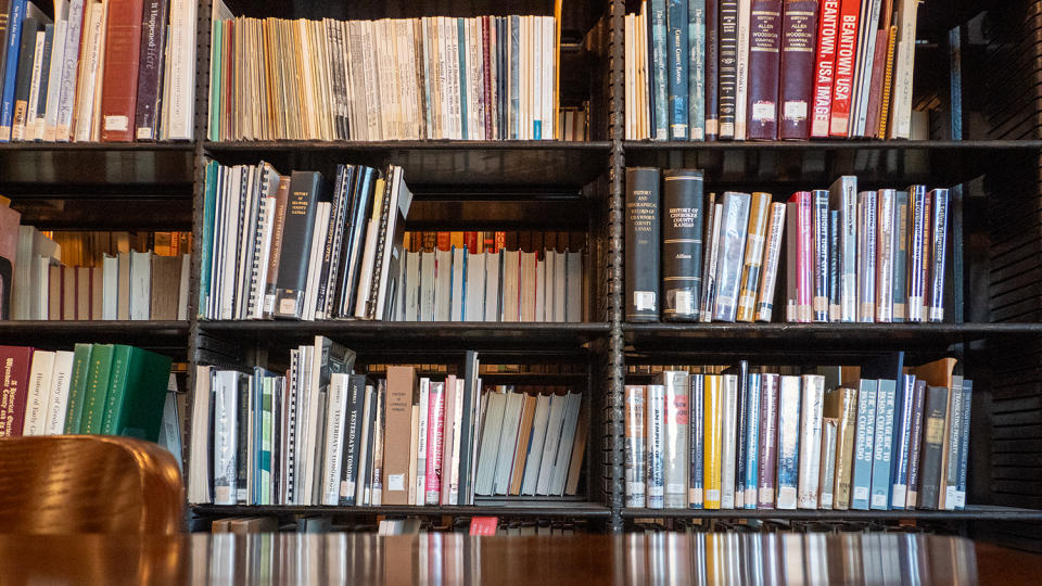 A view of books that rest on the shelves of the state library in the Kansas Statehouse