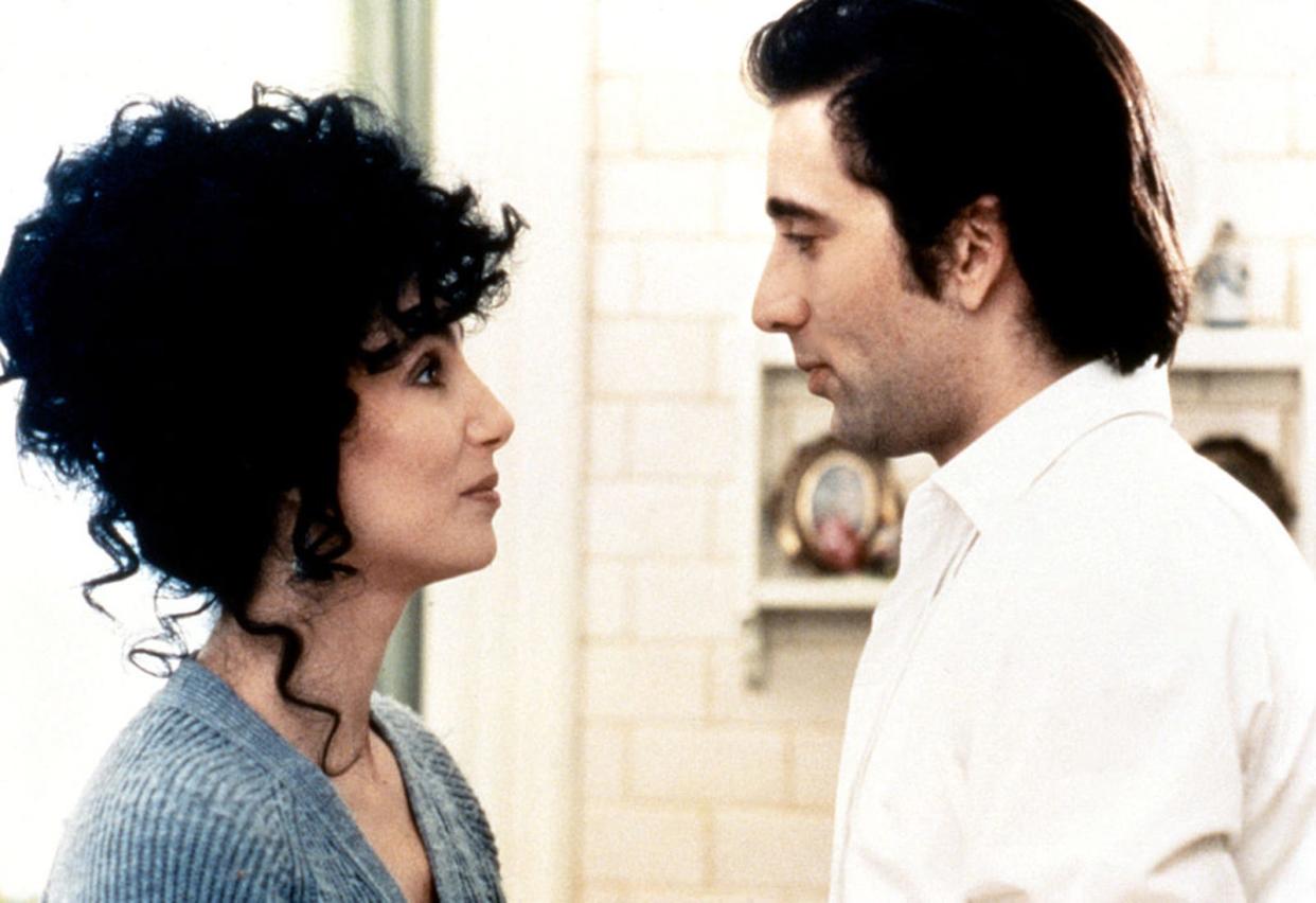American actress and singer Cher and actor Nicolas Cage on the set of "Moonstruck."