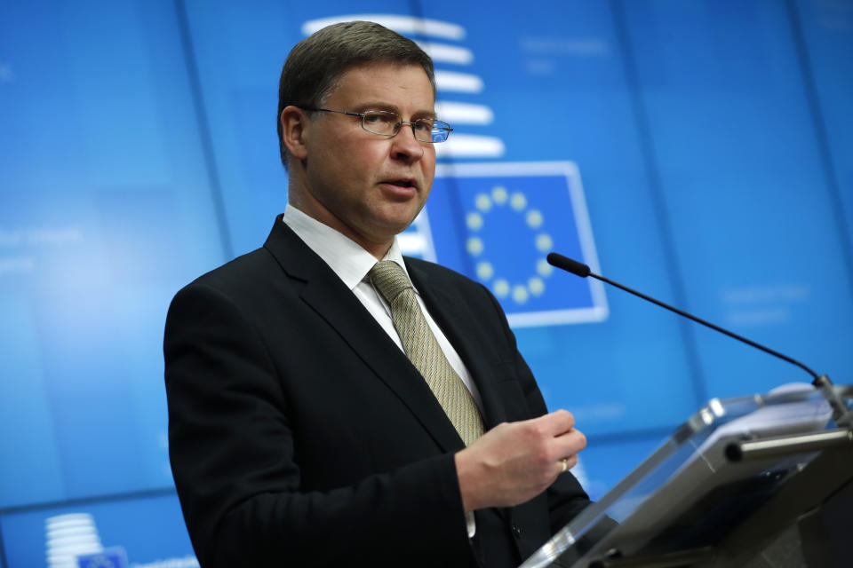 European Commissioner for An Economy that Works for People Valdis Dombrovskis speaks during a news conference following a European Foreign Trade ministers meeting at the European Council headquarters in Brussels, Thursday, May 20, 2021. (AP Photo/Francisco Seco, Pool)