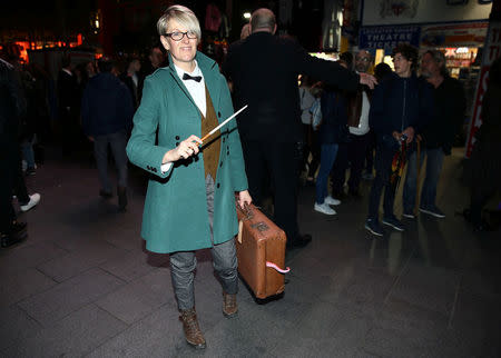 People gather for a global fan event to preview the film "Fantastic Beasts and Where to Find Them" at Cineworld IMAX at Leicester Square in London, Britain October 13, 2016. REUTERS/Neil Hall