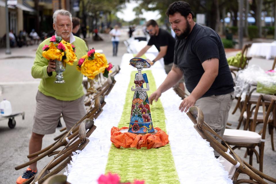 Designer for Rocco's Tacos, Bruce Sutka, left, makes the final preparations for the Savor the Avenue dinner in Delray Beach, March 21, 2016. (Daniel Owen / The Palm Beach Post)