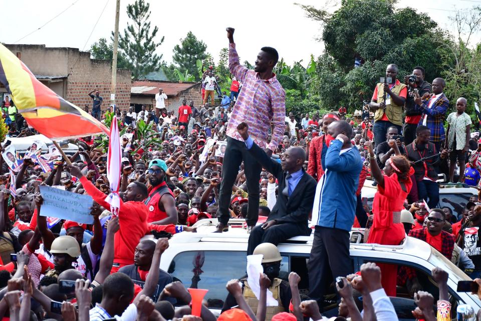 Bobi Wine on top of his vehicle during the 2021 presidential campaigns as he solicited for support in Nakaseke, Central Uganda on November 18, 2020.