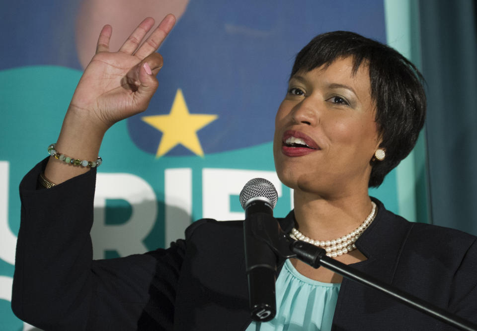 D.C. Mayoral candidate, and Council Member Muriel Bowser gestures as she addresses her supporters at her election night watch party to await the Democrate Primary results in Washington, Tuesday, April 1, 2014. (AP Photo/Cliff Owen)