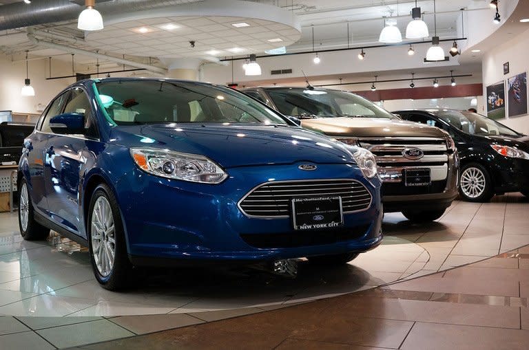 A Ford Focus sits on display at a Manhattan car dealership on July 24, 2013 in New York City. Car industries in the United States and Europe are showing clear signs of getting back on track after severe setbacks in the financial and debt crises