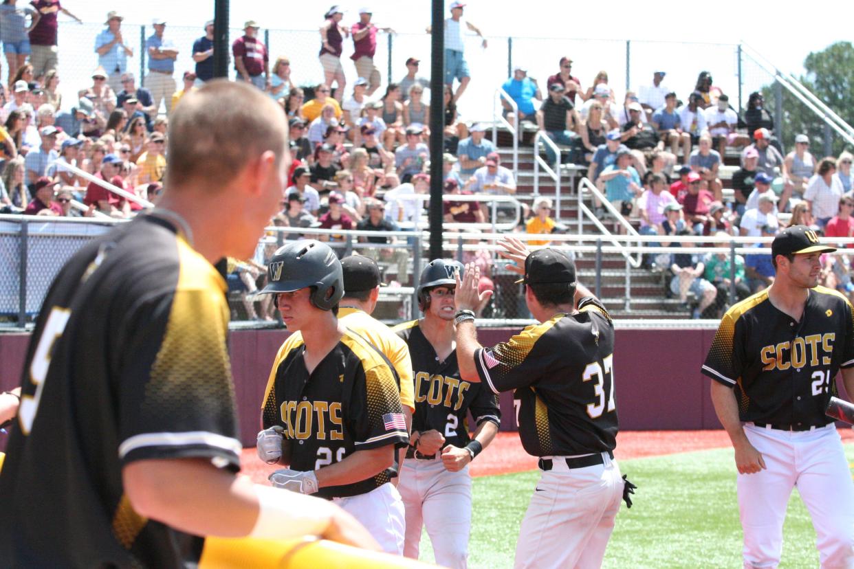 The College of Wooster's Tyler Chumita celebrates after scoring during the Scots' loss in game one of their super regional series with Salisbury.