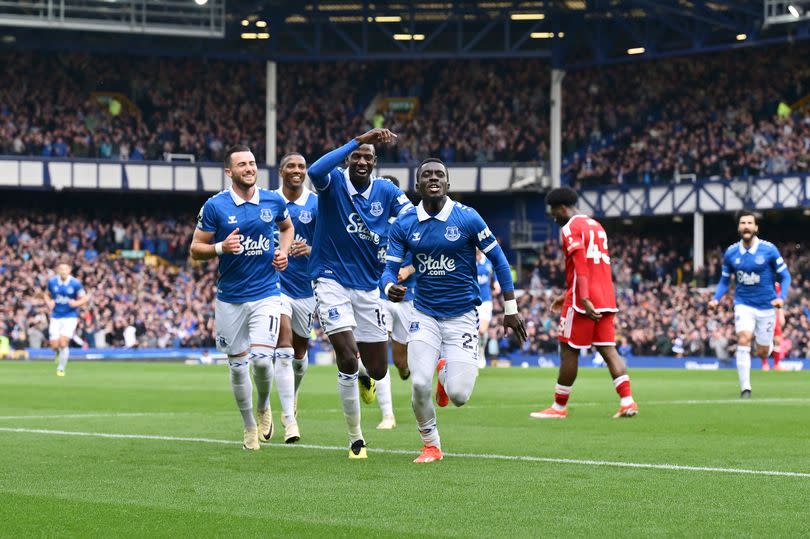 Idrissa Gueye of Everton celebrates his goal with Abdoulaye Doucoure (L) during the Premier League match between Everton FC and Nottingham Forest at Goodison Park on April 21, 2024 -Credit:Photo by Tony McArdle/Everton FC via Getty Images