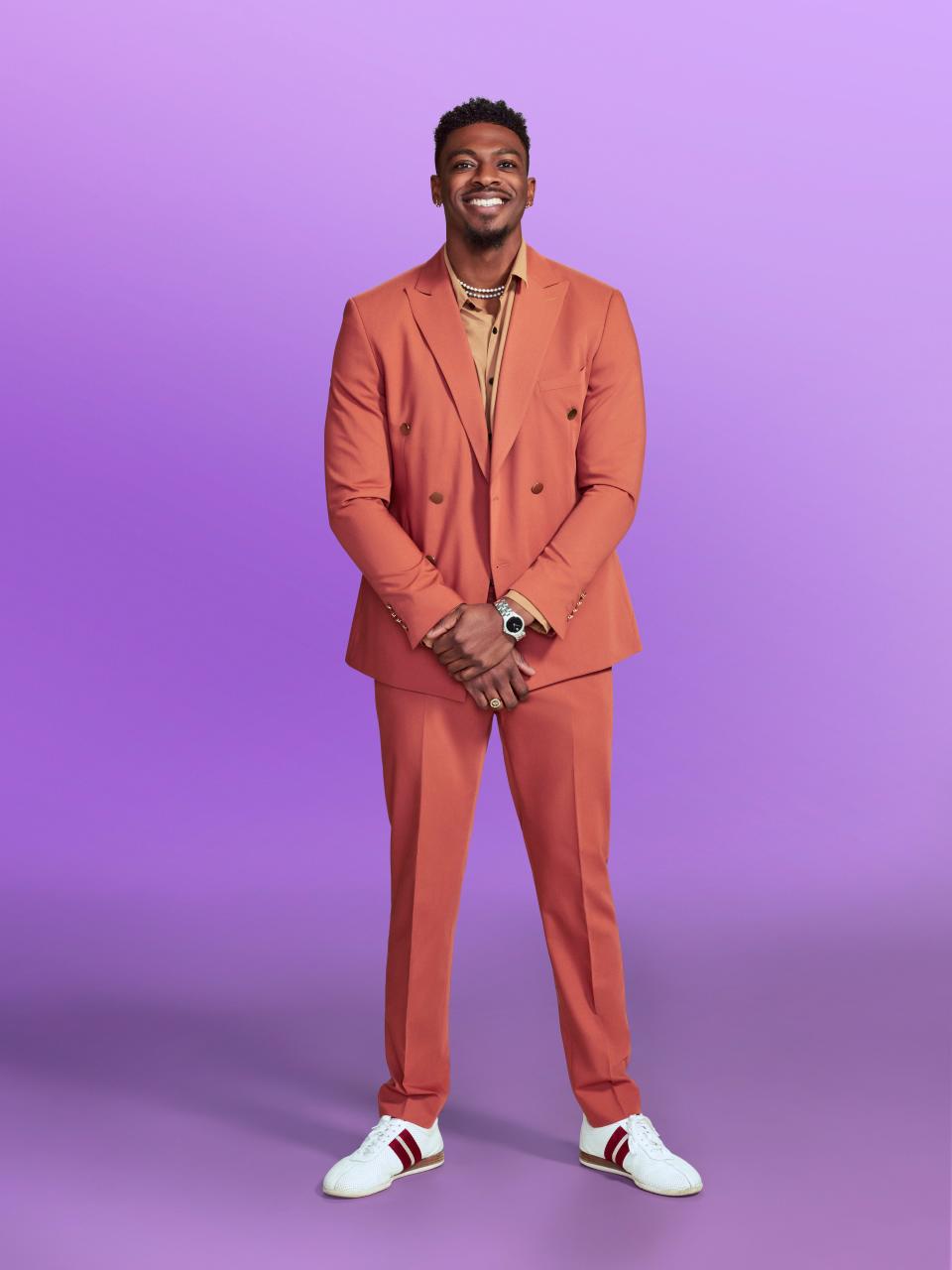 Clay, a contestant on "Love Is Blind" season 6, wearing a suit