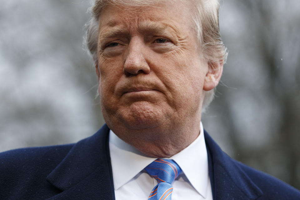 President Donald Trump speaks with reporters before boarding Marine One on the South Lawn of the White House, Friday, April 5, 2019, in Washington. (AP Photo/Evan Vucci)