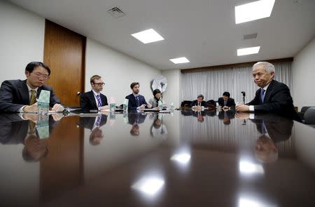 Tokyo Electric Power Co's (TEPCO) President Naomi Hirose speaks (R) during a group interview at the company's headquarters in Tokyo, Japan February 5, 2016. REUTERS/Toru Hanai