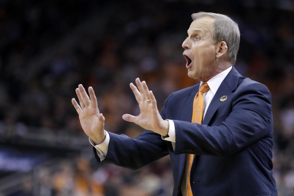 Tennessee head coach Rick Barnes shouts instructions during the second half of a men's NCAA Tournament college basketball South Regional semifinal game against Purdue Thursday, March 28, 2019, in Louisville, Ky. (AP Photo/Michael Conroy)