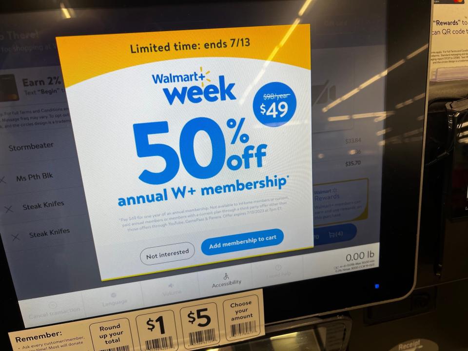 A prompt offering a half-price Walmart+ membership at a self-checkout kiosk.