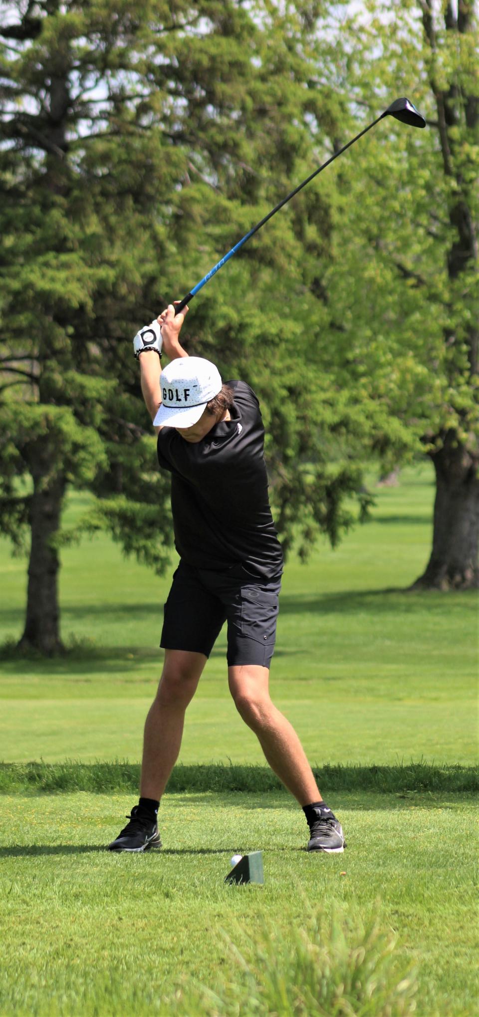 Landon Kongeal of Gibraltar Carlson tees off during the Monroe County Championship Monday.