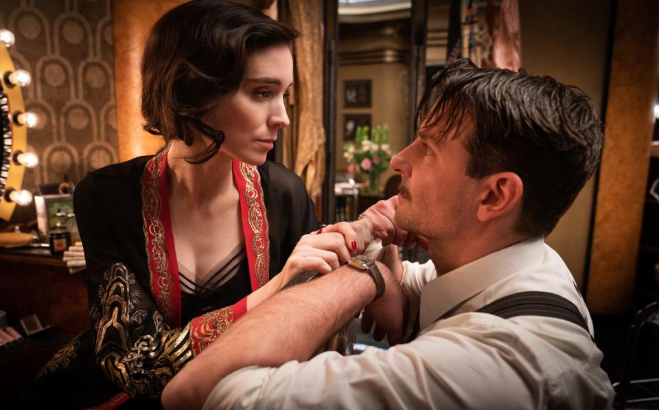 Rooney Mara and Bradley Cooper in “Nightmare Alley” - Credit: Kerry Hayes/20th Century Studios