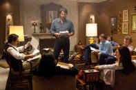 This film image released by Warner Bros. Pictures shows Ben Affleck as Tony Mendez, center, in "Argo," a rescue thriller about the 1979 Iranian hostage crisis. On Thursday, Dec. 13, 2013, Affleck was nominated for a Golden Globe for best director and "Argo" received a nomination for best film. The 70th annual Golden Globe Awards will be held on Jan. 13. (AP Photo/Warner Bros., Claire Folger)