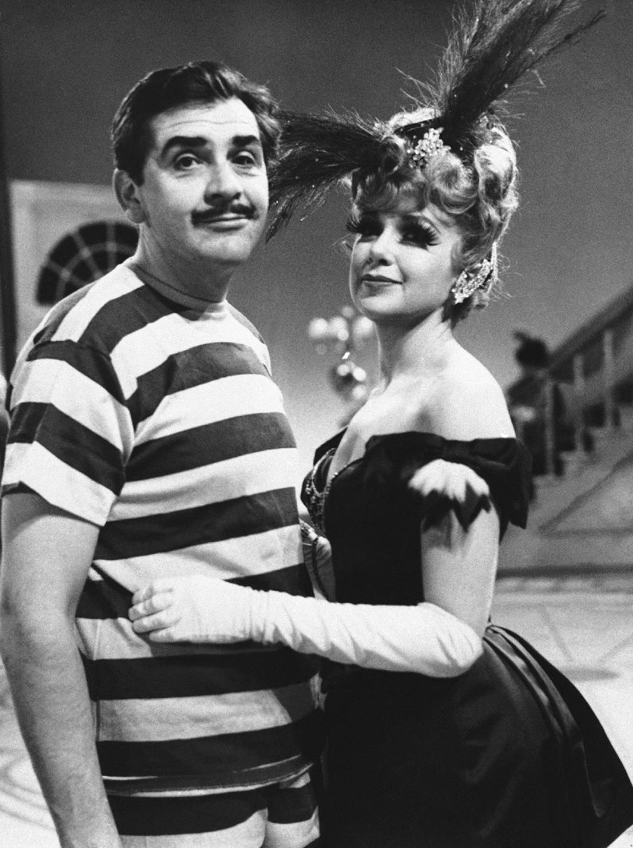 FILE - In this Feb. 22, 1961 file photo, TV auter Ernie Kovacs, left, and Edie Adams appear on the set of “Private Eye Private Eye." Kovacs once said, "Television is a medium because it is neither rare nor well done." (AP Photo, file)