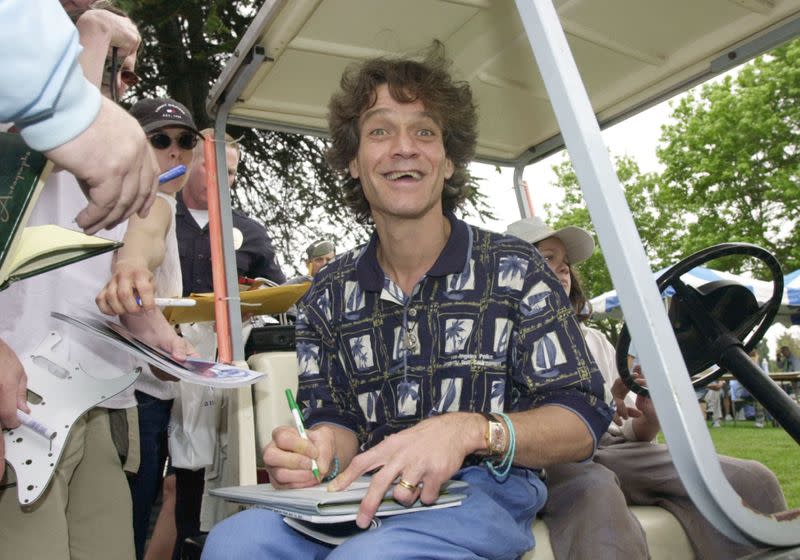 FILE PHOTO: EDDIE VAN HALEN SIGN AUTOGRAPHS AT LOS ANGELES POLICE-CELEBRITY GOLF TOURNAMENT.