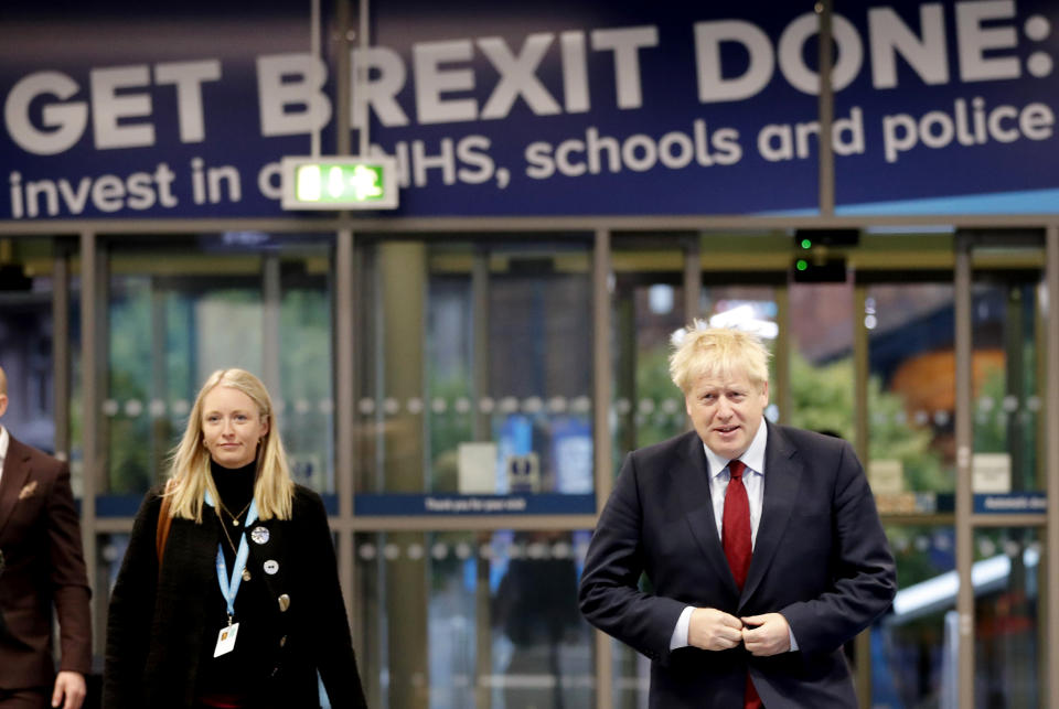Britain's Prime Minister Boris Johnson arrives for interviews at the Conservative Party Conference in Manchester, England, Tuesday, Oct. 1, 2019.(AP Photo/Frank Augstein)