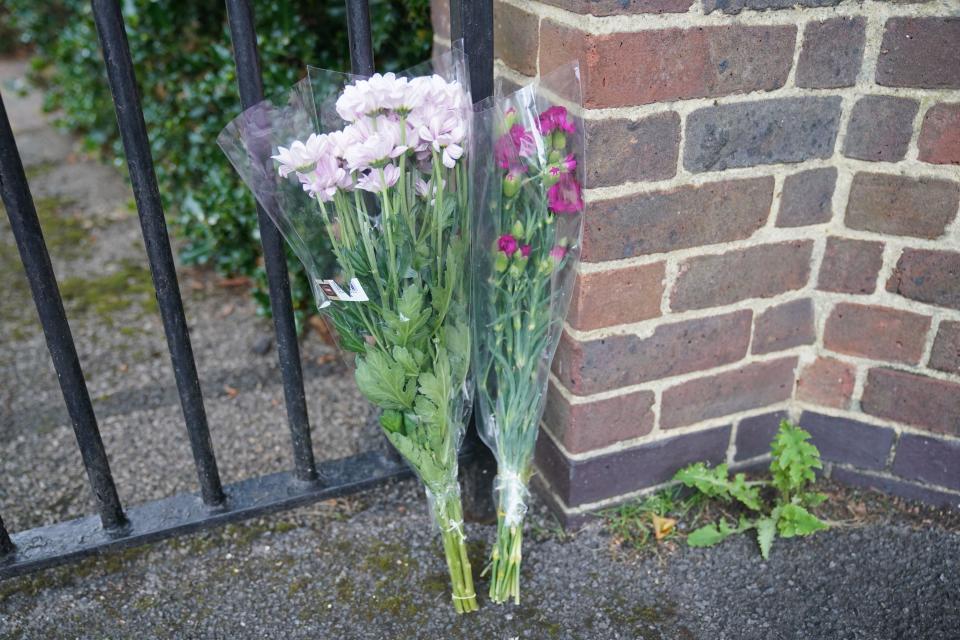 Flowers outside the Old Palace of John Whitgift School in Croydon, a pupil who attends the school was stabbed to death on Wednesday morning near the Whitgift shopping centre in Croydon. Picture date: Wednesday September 27, 2023.