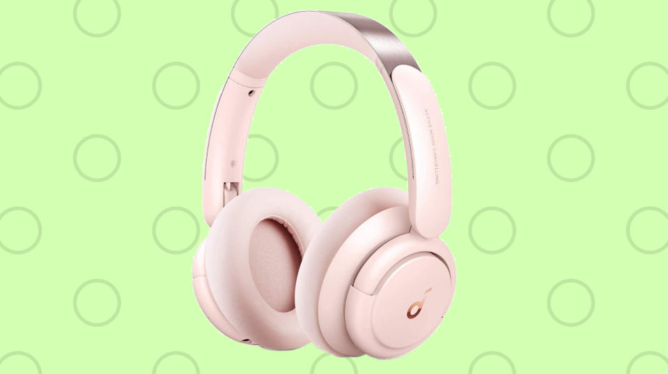 Pearlescent pink wireless headphones with cushy ear cup. 