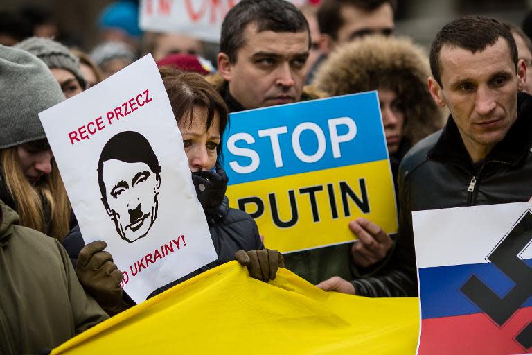 Ukrainian and Polish people protest in front of Russian embassy in Warsaw, on March 2, 2014