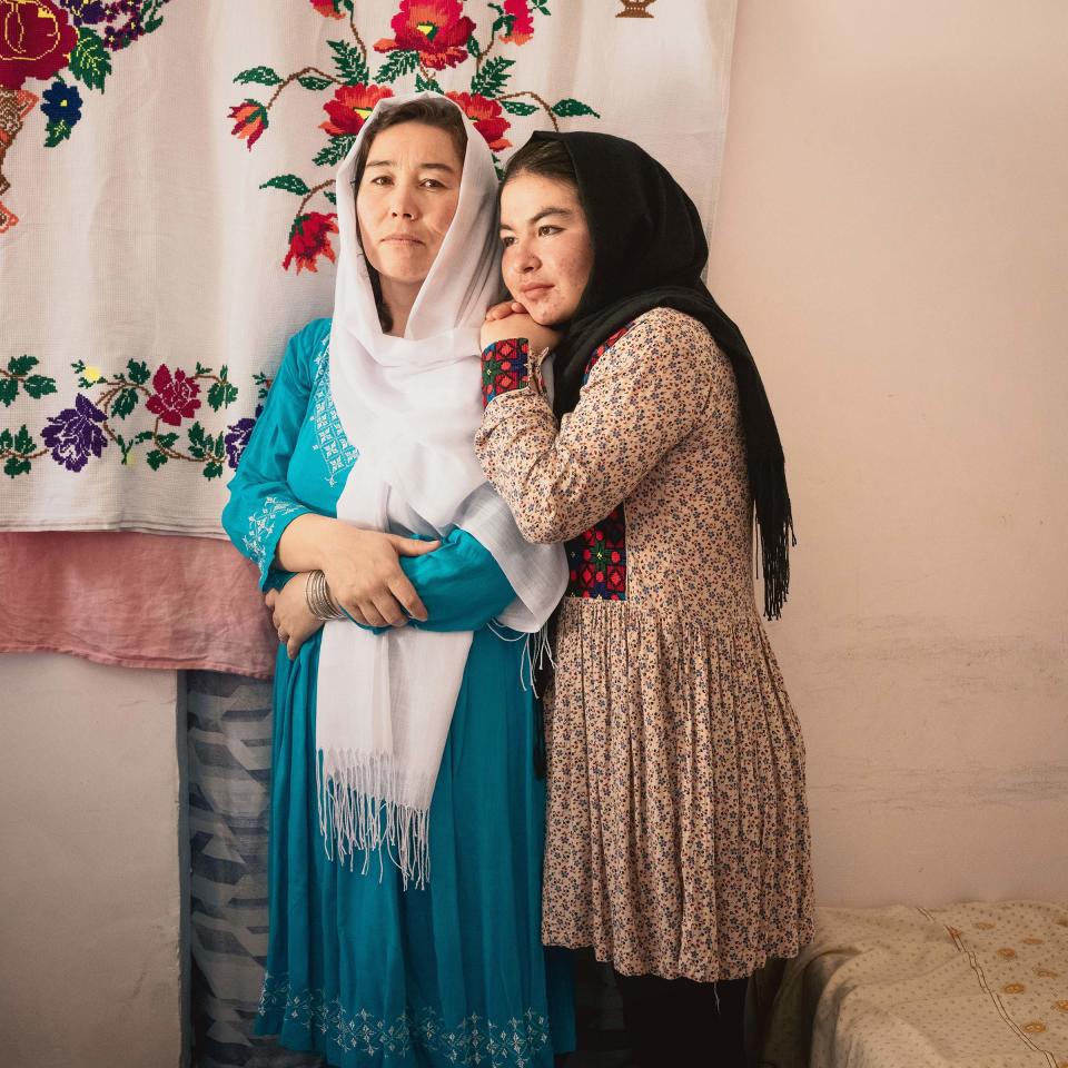 <strong>Biology teacher Najiba Ebrahimi and her daughter, Azada, in São Paulo, Brazil, on July 10.</strong> "<a href="https://time.com/afghan-women-kabul-fall-anniversary/" rel="nofollow noopener" target="_blank" data-ylk="slk:Far From Home: One year after the fall of Kabul, Afghan women are attempting to build new lives abroad,;elm:context_link;itc:0;sec:content-canvas" class="link ">Far From Home: One year after the fall of Kabul, Afghan women are attempting to build new lives abroad,</a>" August 22 issue.<span class="copyright">Luisa Dörr for TIME</span>