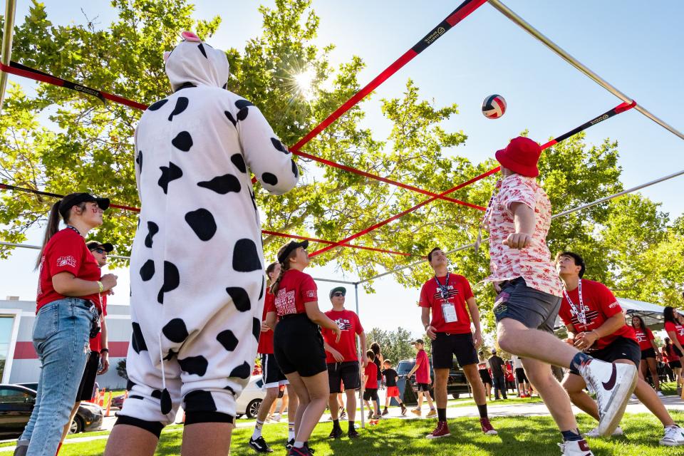 Member of the MUSS play 9 square while tailgating before the Utah verses Weber State football game at Rice-Eccles Stadium in Salt Lake City on Saturday, Sept. 16, 2023. | Megan Nielsen, Deseret News