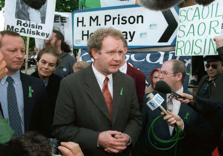 FILE PHOTO: Sinn Fein member of parliament Martin McGuinness speaks to the media outside Holloway Prison, in London, Britain May 13, 1997. REUTERS/Paul Hackett/File Photo