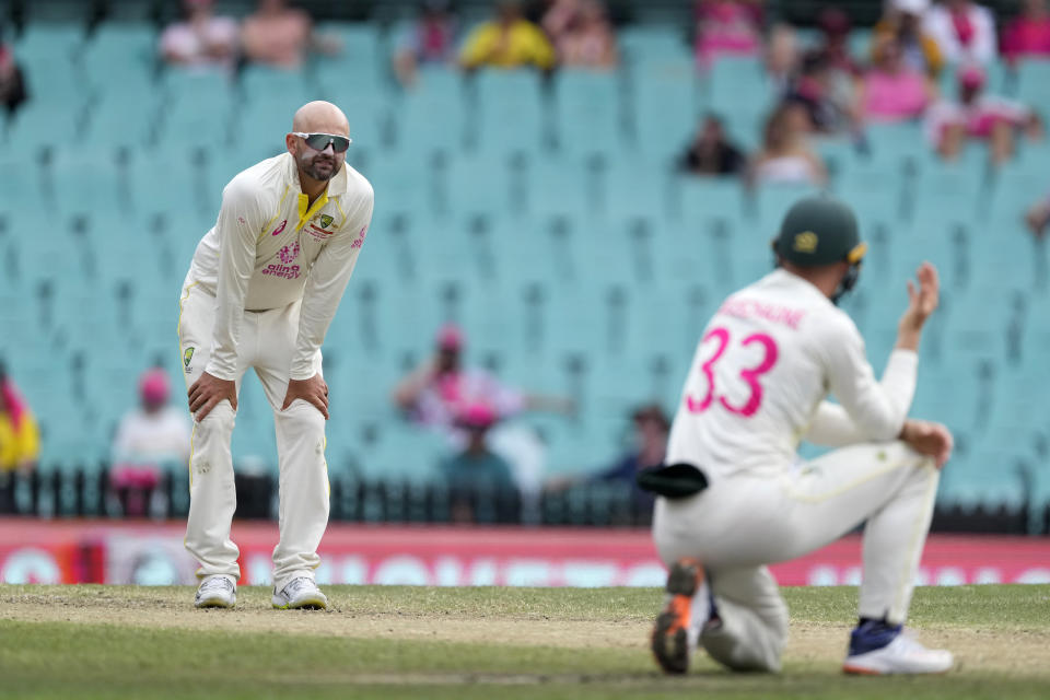 Australia's Nathan Lyon pauses after bowling a delivery to South Africa during the fourth day of their cricket test match at the Sydney Cricket Ground in Sydney, Saturday, Jan. 7, 2023. (AP Photo/Rick Rycroft)