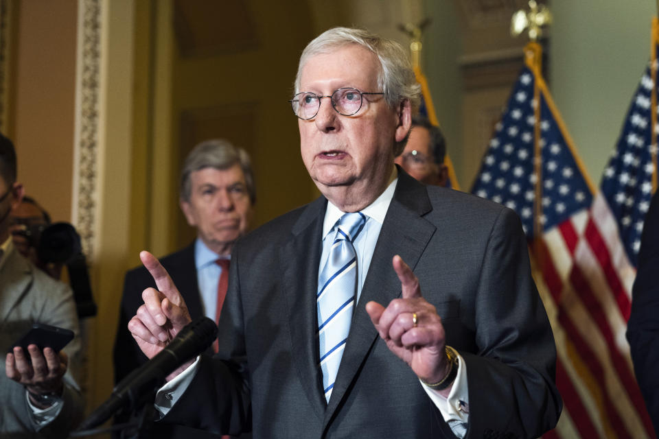 Senate Minority Leader Mitch McConnell of Ky., with Sen. Roy Blunt, R-Mo., left, speaks to reporters during a news conference following the Republican policy luncheon on Capitol Hill, Tuesday, June 7, 2022, in Washington. (AP Photo/Manuel Balce Ceneta)