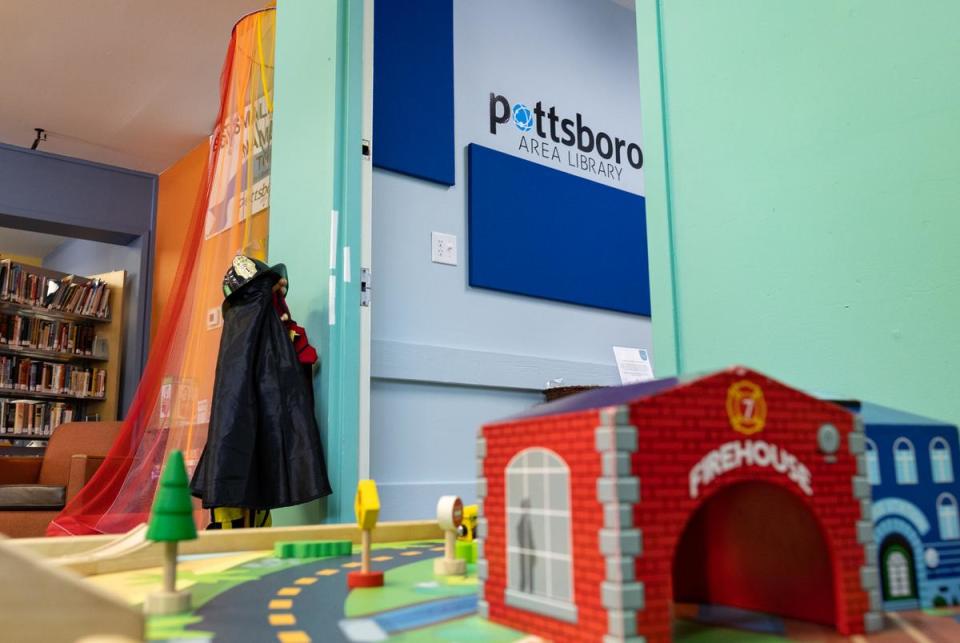 The door to the telehealth room can be seen from the Pottsboro library's kids area on Aug. 18, 2023. It is fully equipped with medical supplies, informational pamphlets and a computer allowing people to schedule video calls with doctors and counselors. 