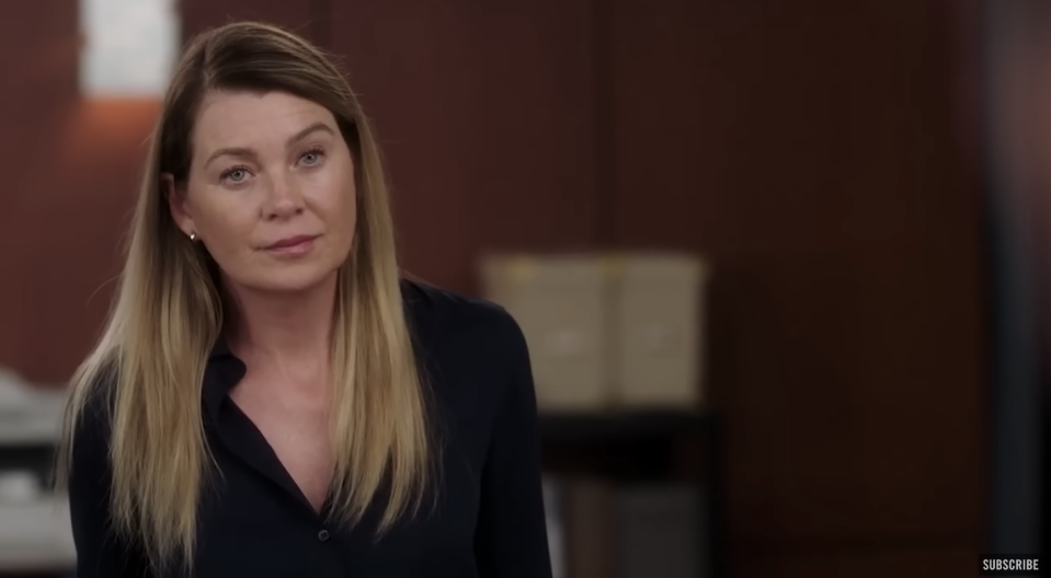 Meredith Grey wearing a black business shirt from a scene in Grey's Anatomy