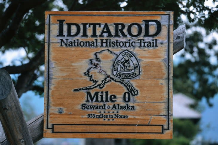 Sign at the beginning of the famous dog sled race, the Iditarod, at Seward, Alaska.