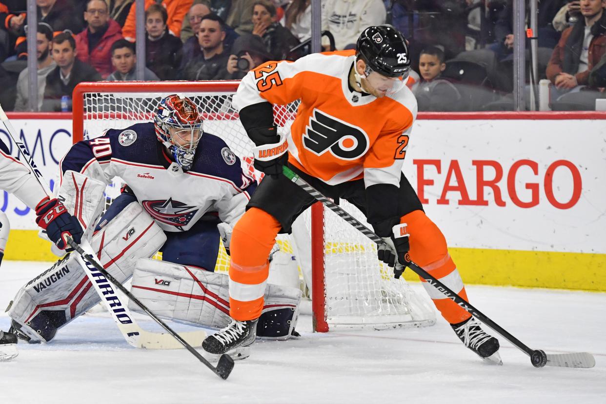 Dec 20, 2022; Philadelphia, Pennsylvania, USA; Philadelphia Flyers left wing James van Riemsdyk (25) with the puck against Columbus Blue Jackets goaltender Daniil Tarasov (40) during the second period at Wells Fargo Center. Mandatory Credit: Eric Hartline-USA TODAY Sports