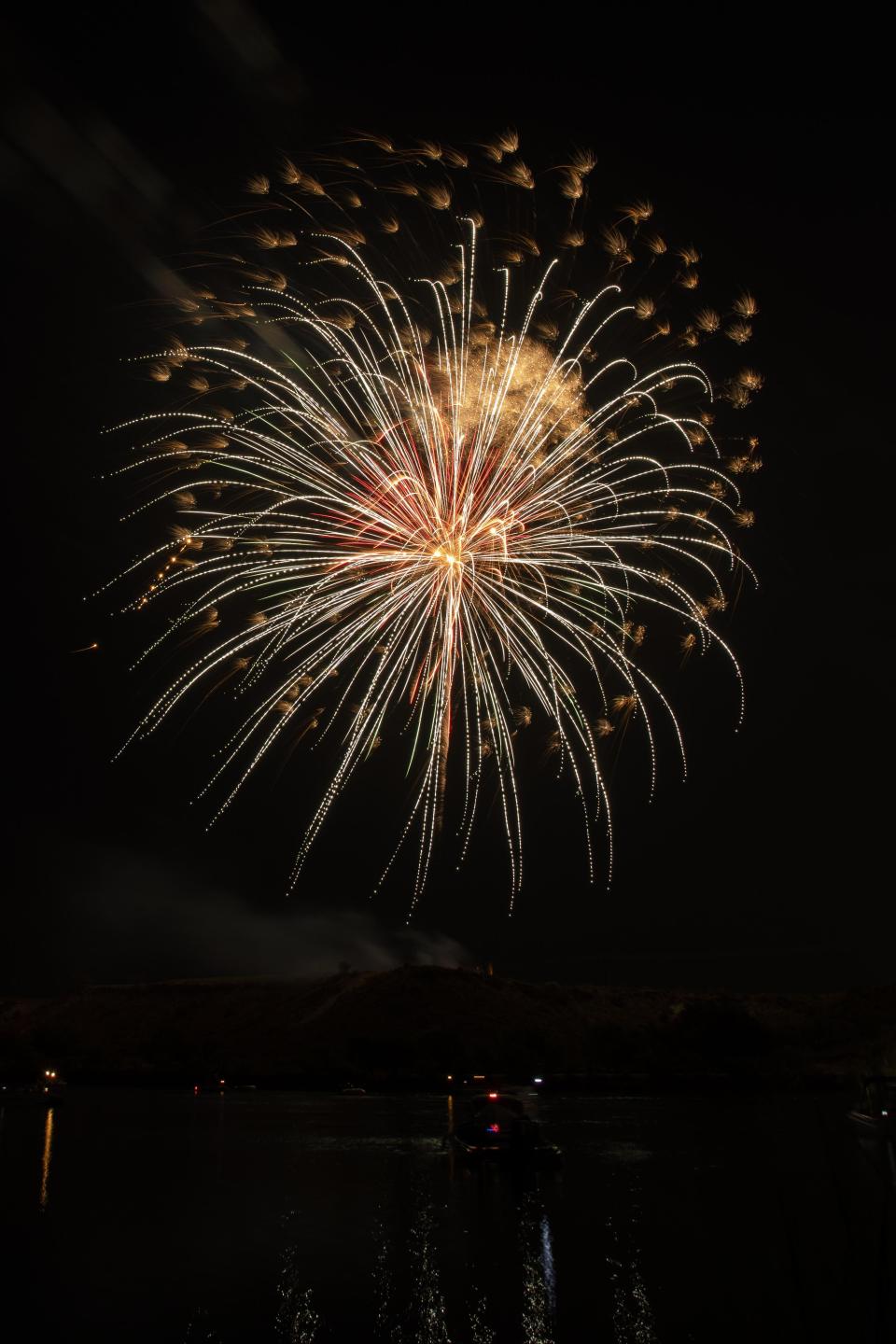 Fireworks go off over Buffalo Springs Lake for the annual fireworks show to celebrate the Fourth of July on Friday, July 3, 2020, in Buffalo Springs, Texas.
