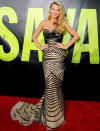 <br>Blake looked stunning on the red carpet at the premiere of 'Savages' in a form-fitting Zuhair Murad nude and black dress. Golden waves and red lipstick completed the retro look.