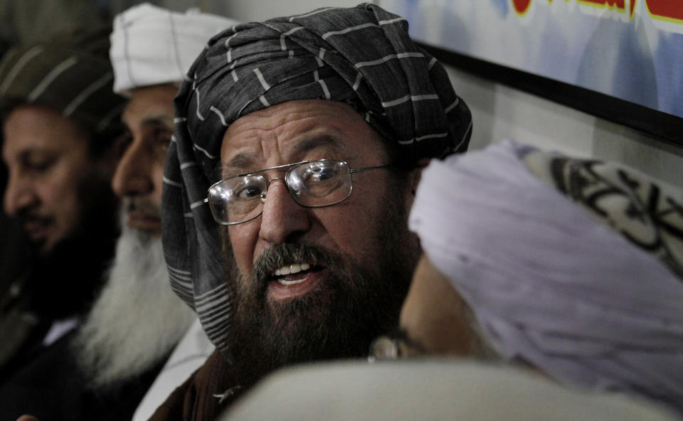 Pakistani religious cleric and member of Taliban's negotiating committee Maulana Sami-ul-Haq answers a question during a press conference in Islamabad, Pakistan, Tuesday, Feb. 4, 2014. A three-member committee appointed by Pakistani Taliban to hold peace talks with Pakistan has accused its Pakistani counterparts of scuttling the peace process by not turning up for the first round of talks in the capital. (AP Photo/Anjum Naveed)