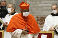 American new Cardinal Wilton D. Gregory leaves after he was appointed by Pope Francis, during a consistory ceremony where 13 bishops were elevated to a cardinal's rank in St. Peter’s Basilica at the Vatican, Saturday, Nov. 28, 2020. (Fabio Frustaci/POOL via AP)