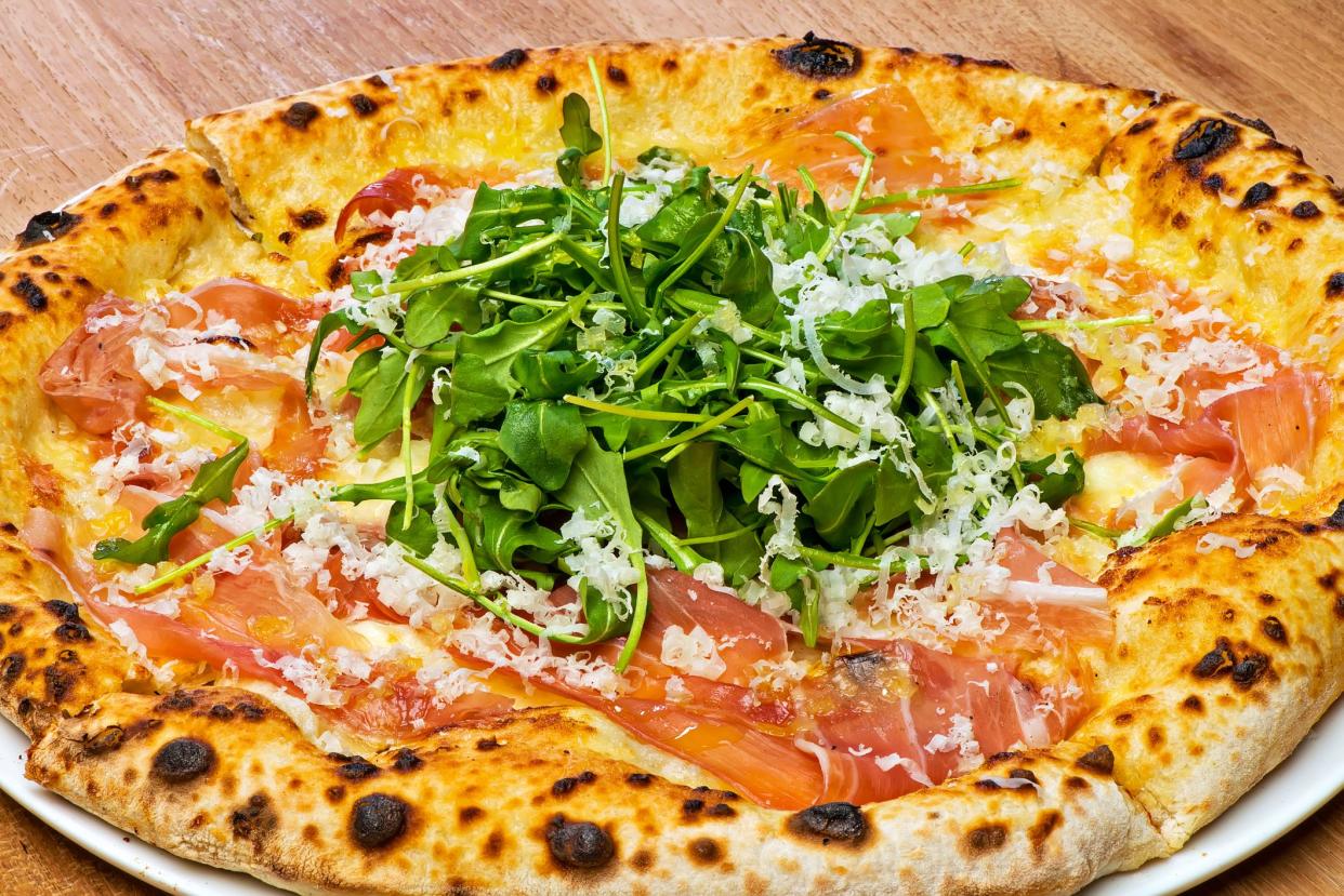 <p><br></p><p>California-style pizzas are usually single-serving, with a crust similar to New York-style. Where it really differentiates itself, however, is in the toppings. When this style of pizza was popularized at Wolfgang Puck’s West Hollywood hotspot Spago in the 1980s, toppings including goat cheese, duck sausage, smoked salmon, prosciutto, and seasonal vegetables including zucchini flowers, inspired by the local-focused “California cuisine” movement, were simply unheard-of.</p><p><br></p><p><i>This article originally appeared on <a href="https://blog.goldbelly.com/guide-to-regional-pizza-styles/" rel="nofollow noopener" target="_blank" data-ylk="slk:Blog.goldbelly.com;elm:context_link;itc:0;sec:content-canvas" class="link rapid-noclick-resp">Blog.goldbelly.com</a> and was syndicated by <a href="https://mediafeed.org/" rel="nofollow noopener" target="_blank" data-ylk="slk:MediaFeed.org.;elm:context_link;itc:0;sec:content-canvas" class="link rapid-noclick-resp">MediaFeed.org.</a></i><br></p><span class="copyright"> BlueSkye Creative Inc./Istockphoto </span>