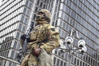 A member of the National Guard stands guard in front of the Philadelphia Municipal Services Building in Philadelphia, Pa., Friday, Oct. 30, 2020. (Jose F. Moreno/The Philadelphia Inquirer via AP)