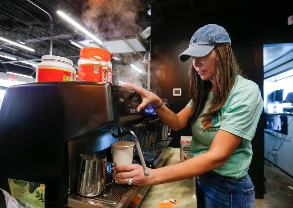 Josie Wodtke makes a cup of tea at The Washboard Cafe on Wednesday, March 29, 2023.