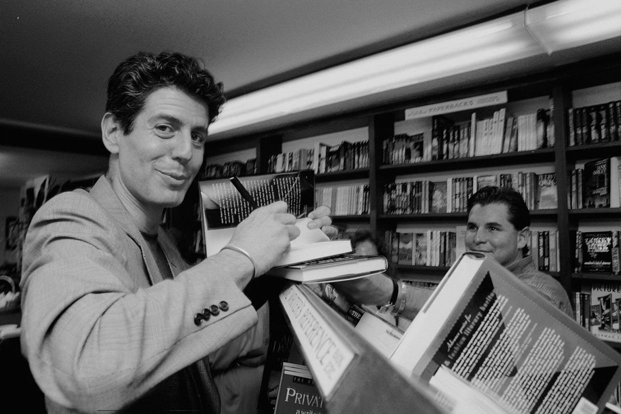 Anthony Bourdain was a recognized food writer on top of his careers as chef and host of shows like "Parts Unknown" and "No Reservation." Bourdain is pictured here as he signs his first book, "Bone in the Throat," in 1995.